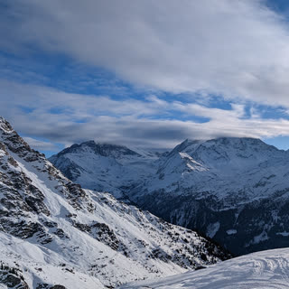 Exploration Inward cover: snowy mountains under a cloudy sky